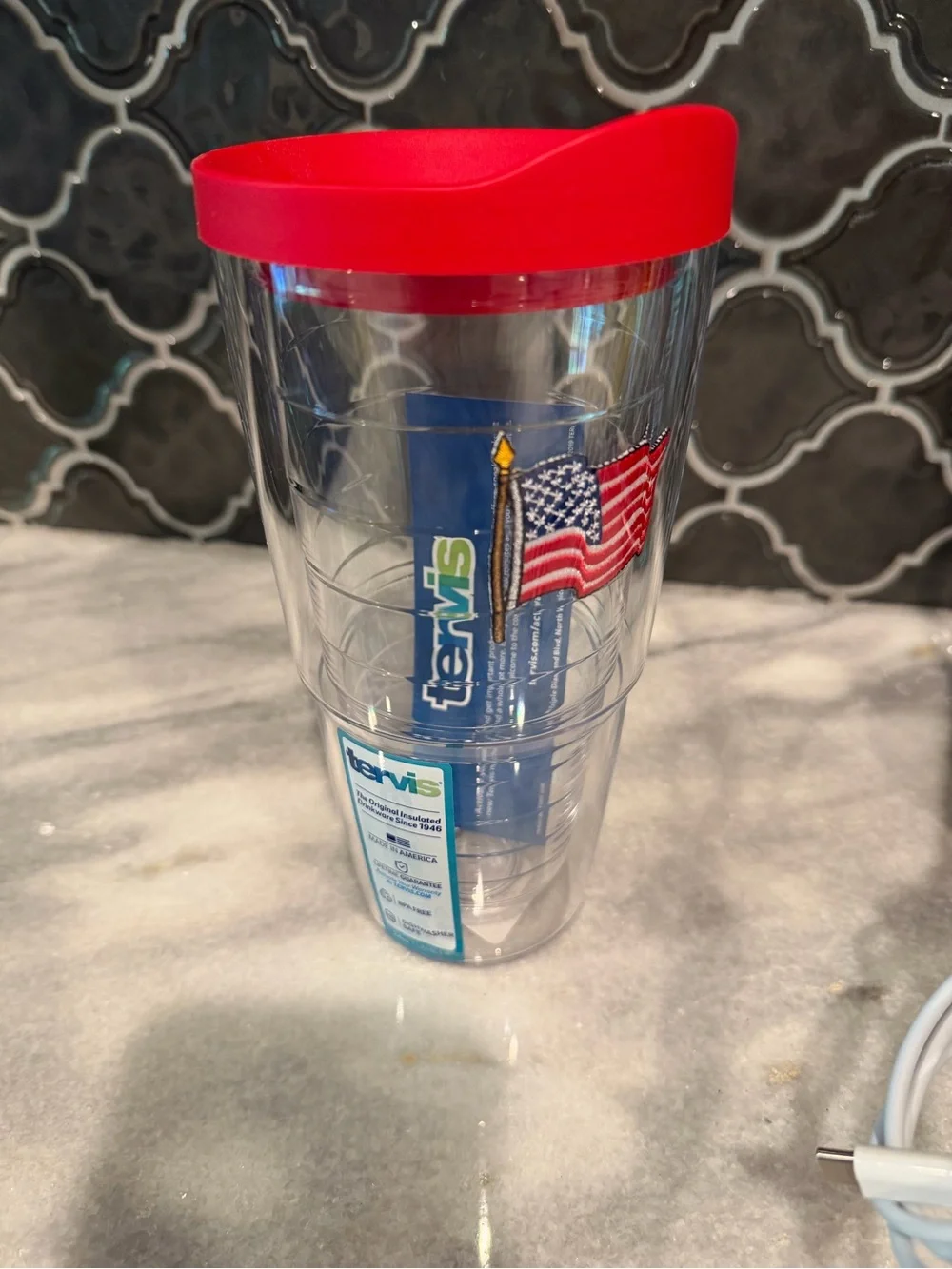 Clear Travel Tumbler with Red Lid and American Flag Design